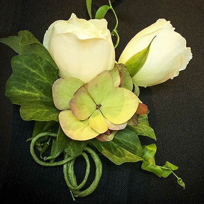 This delicate handmade rose bud boutonniere is ready for its debut.